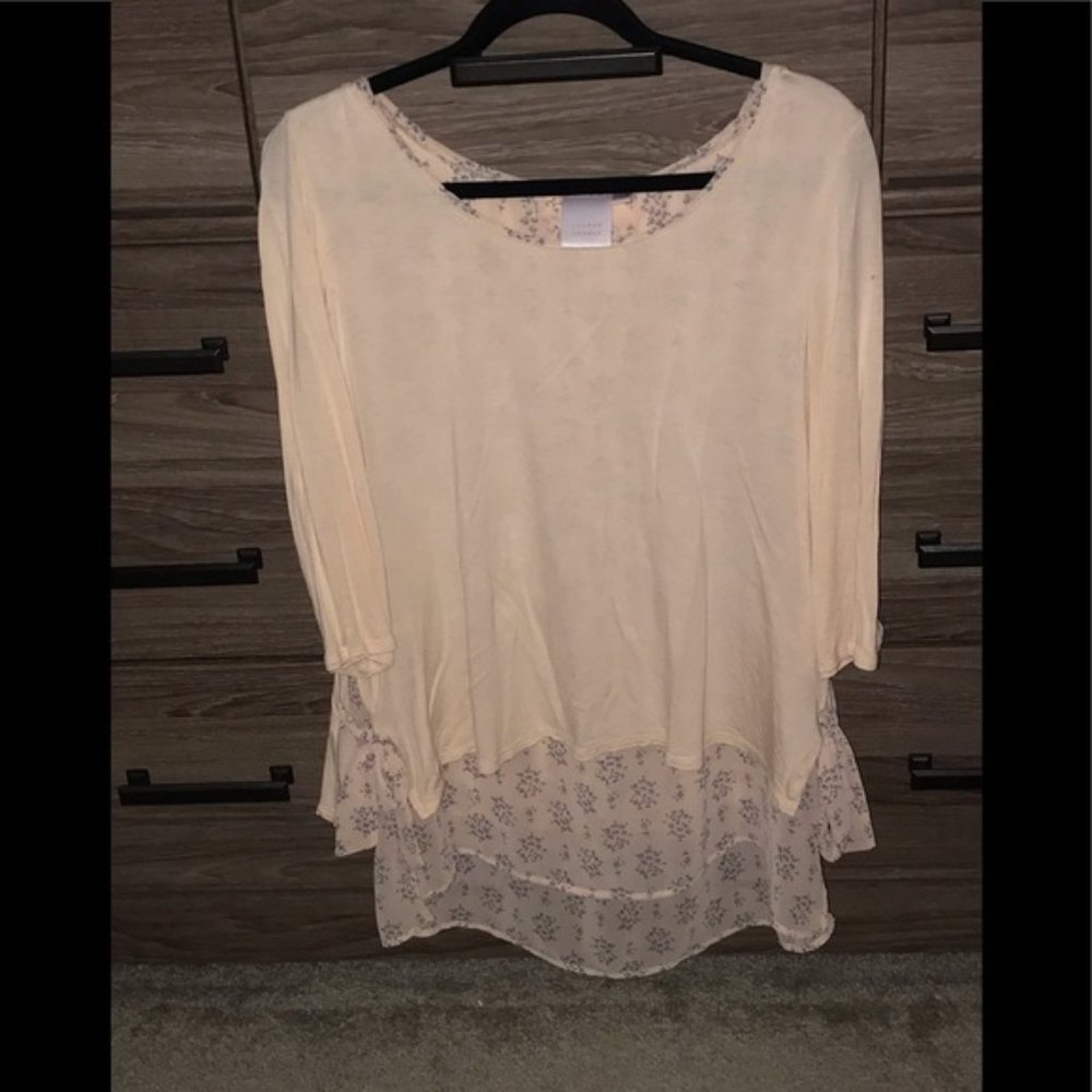 Woman’s LC peach blouse